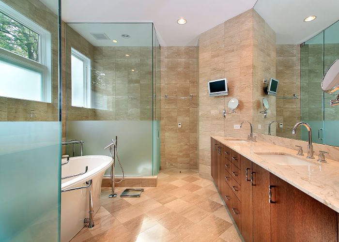 A bathroom remodel in Sarasota can include built-in electronics.